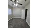 Bedroom featuring carpet, ceiling fan and window at 849 W Spur Ave, Gilbert, AZ 85233