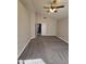 Vaulted bedroom featuring neutral walls, carpet flooring, and a ceiling fan at 849 W Spur Ave, Gilbert, AZ 85233