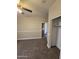 Bedroom features neutral walls and carpet, with a closet and partial view of the ensuite bathroom at 849 W Spur Ave, Gilbert, AZ 85233