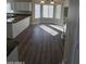 Breakfast nook with bay window and granite counters leading to the kitchen at 849 W Spur Ave, Gilbert, AZ 85233