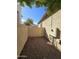 Narrow side yard area with gravel landscaping, offering a low-maintenance space for utilities at 849 W Spur Ave, Gilbert, AZ 85233