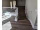 Staircase featuring clean white railings and modern flooring leading to the home's downstairs living area at 849 W Spur Ave, Gilbert, AZ 85233