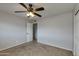 Bedroom with carpeted floor and ceiling fan at 8608 E Vernon Ave, Scottsdale, AZ 85257