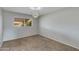 Bedroom with window and carpeted floor at 8608 E Vernon Ave, Scottsdale, AZ 85257