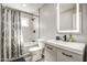 Bathroom featuring a shower and tub with a modern vanity and decorative mirror at 901 W Parkway Blvd, Tempe, AZ 85281