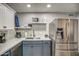 Contemporary kitchen featuring stainless steel appliances and a large stainless steel refrigerator at 901 W Parkway Blvd, Tempe, AZ 85281