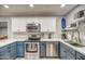 Beautiful kitchen featuring white upper cabinets and stainless steel appliances at 901 W Parkway Blvd, Tempe, AZ 85281