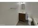 Bathroom features tile flooring, vanity, mirror and toilet at 9023 N 18Th Ave, Phoenix, AZ 85021