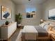 Calm bedroom with modern decor, bright window, and neutral color palette at 9023 N 18Th Ave, Phoenix, AZ 85021