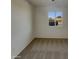 Bright bedroom with a view from the window, neutral paint, and carpet flooring at 9023 N 18Th Ave, Phoenix, AZ 85021