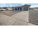 Front exterior view of a cozy home with tidy landscaping and a spacious driveway at 9023 N 18Th Ave, Phoenix, AZ 85021