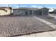 Charming home featuring low-maintenance landscaping and walkway leading to the front entrance at 9023 N 18Th Ave, Phoenix, AZ 85021