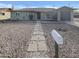 Charming home featuring low-maintenance landscaping and walkway leading to the front entrance at 9023 N 18Th Ave, Phoenix, AZ 85021