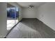 Living room with tile floors and large sliding glass doors to the backyard at 9023 N 18Th Ave, Phoenix, AZ 85021