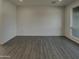 A large living room has tile flooring and recessed lighting at 9023 N 18Th Ave, Phoenix, AZ 85021