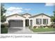 Spanish Colonial style home showcasing a neutral color scheme, shutters, and a well-maintained front yard at 921 W Peralta Pass, Apache Junction, AZ 85120