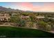 Panoramic aerial view of the property nestled in a community, showcasing lush landscaping at 9290 E Thompson Peak Pkwy # 142, Scottsdale, AZ 85255