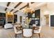 Dining room with chandelier lighting, seating for six, and bright views of the exterior at 9290 E Thompson Peak Pkwy # 142, Scottsdale, AZ 85255