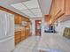 Well-lit kitchen with modern appliances, ample cabinet space, and tile flooring at 9313 W Arrowhead Dr, Sun City, AZ 85351