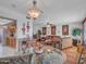 Open-concept living space connecting dining room and kitchen for seamless entertaining at 9313 W Arrowhead Dr, Sun City, AZ 85351