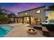 Outdoor oasis features a covered patio, pool, hot tub, and fire pit for ultimate relaxation and entertainment at 10829 N 11Th Pl, Phoenix, AZ 85020