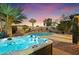 Backyard showcasing a hot tub, pool, and lush landscaping, perfect for relaxation at 10829 N 11Th Pl, Phoenix, AZ 85020