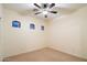 Spacious bedroom featuring unique arched windows and neutral-toned walls at 10829 N 11Th Pl, Phoenix, AZ 85020