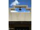 Exterior detail showing bell hanging from a Southwestern style structure against blue sky at 11407 N Pinto Dr, Fountain Hills, AZ 85268