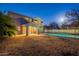 An inviting backyard boasts a private pool and covered patio for outdoor enjoyment at 1737 E Azalea Dr, Gilbert, AZ 85298