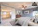 Comfortable bedroom featuring a ceiling fan and lots of natural light at 1737 E Azalea Dr, Gilbert, AZ 85298