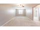 Spacious bonus room featuring plush carpeting, neutral walls and natural light at 1737 E Azalea Dr, Gilbert, AZ 85298