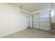 Garage featuring an entry door and garage door at 1737 E Azalea Dr, Gilbert, AZ 85298