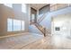 Expansive living area with a soaring ceiling, fireplace, and abundant natural light at 1737 E Azalea Dr, Gilbert, AZ 85298