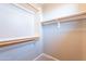 Walk-in closet with shelves, rods, and plenty of room for storage at 1737 E Azalea Dr, Gilbert, AZ 85298