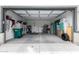 Spacious two-car garage featuring ample storage space and an organized layout at 18644 N Desert Willow Dr, Maricopa, AZ 85138