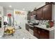 Well-equipped kitchen with granite countertops and stainless steel appliances at 18644 N Desert Willow Dr, Maricopa, AZ 85138