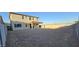 Spacious backyard area with a covered patio and block wall fencing at 19201 W Missouri Ave, Litchfield Park, AZ 85340