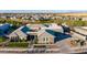 Stunning aerial view of a luxury home showcasing meticulous landscaping, a paver driveway, and a well-maintained lawn at 19912 E Natalie Way, Queen Creek, AZ 85142