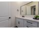 Sleek bathroom features a modern vanity with black hardware and a stylish mirror, creating a spa-like retreat at 19912 E Natalie Way, Queen Creek, AZ 85142