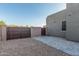 Modern home's driveway with secure gates at 19912 E Natalie Way, Queen Creek, AZ 85142