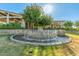 Exterior view of water feature by community clubhouse featuring trees, rock waterfall and landscaped area at 19912 E Natalie Way, Queen Creek, AZ 85142