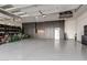 Well-organized garage with custom cabinets provides ample space for storage and organization of tools and equipment at 19912 E Natalie Way, Queen Creek, AZ 85142