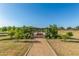Enjoy the community's greenspace featuring landscaping, walking paths, and gathering spaces at 19912 E Natalie Way, Queen Creek, AZ 85142