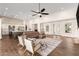 Expansive living area featuring a modern design with high ceilings, an open kitchen, and lots of light at 19912 E Natalie Way, Queen Creek, AZ 85142
