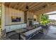 The community entertainment space features a fireplace, TV, and comfortable seating at 19912 E Natalie Way, Queen Creek, AZ 85142