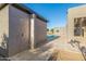 Modern backyard with stylish outdoor shower and views of the pool at 19912 E Natalie Way, Queen Creek, AZ 85142