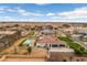 Aerial view of the home with a swimming pool and spacious backyard at 21442 E Excelsior Ave, Queen Creek, AZ 85142