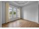 Bedroom featuring high ceilings, lots of natural light, and modern design at 21442 E Excelsior Ave, Queen Creek, AZ 85142