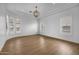 Spacious bedroom featuring a decorative ceiling and many windows at 21442 E Excelsior Ave, Queen Creek, AZ 85142