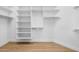 White walk-in closet with shelves and clothing rods at 21442 E Excelsior Ave, Queen Creek, AZ 85142
